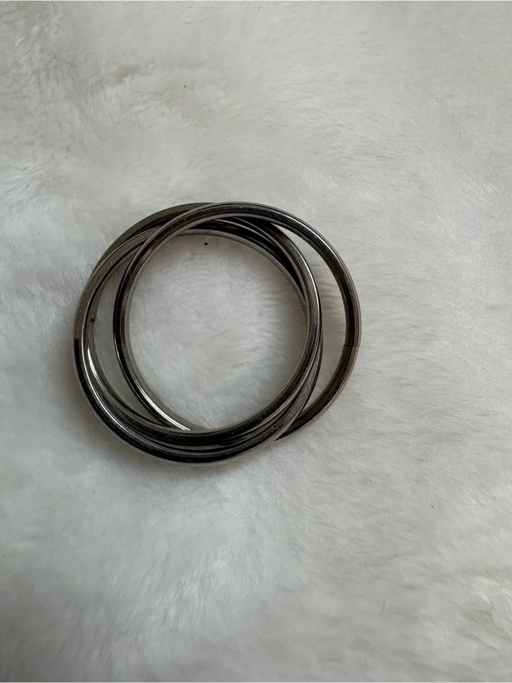 2 Black and Silver Metal triple rings, sizes 9 and 9 1/2